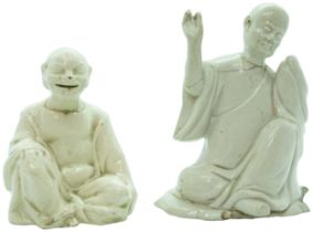 TWO EARLY STAFFORDSHIRE CHINOSERIE FIGURES CIRCA 1760-70 The creamware example depicting a seated