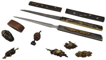 A JAPANESE KOGAI, the handle decorated with a dragon, a fine kozuka with signed blade, two kozuka