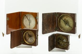 A GEORGIAN POCKET COMPASS IN A SQUARE WOODEN CASE, with paper rose and transit lock and three