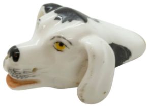 A DOGS HEAD FORM WHISTLE EARLY 19TH CENTURY 4.5cms
