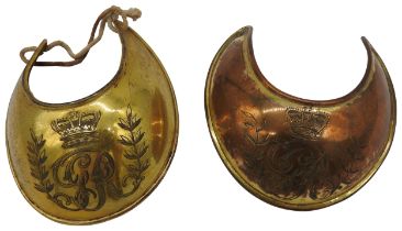 A GEORGIAN GORGET CIRCA 1800 WITH GR CIPHER under a crown and another similar. 11.5 cms