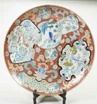 A MASSIVE JAPANESE IMARI CHARGER MEIJI PERIOD, 19TH CENTURY 64cm diam