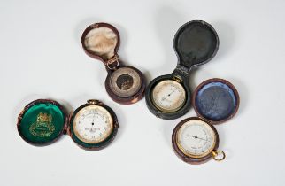 A POCKET ANEROID BAROMETER BY MOTTERSHEAD & CO. MANCHESTER IN A LEATHER CASE, and three others, some