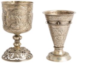 A GERMAN EMBOSSED GOBLET AND A SCANDINAVIAN BEAKER, C.1870 The German goblet with pierced base,