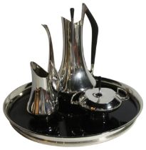 A four piece Donald Colflesh coffee set with circular tray.