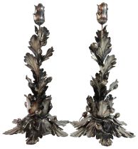 A pair of silver candlesticks - 20th century in the buccellati style with leaves & acorns. (Height