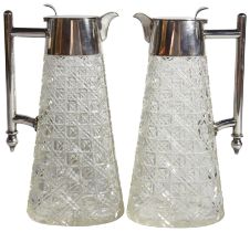 A pair of cut glass decanters with silver plated handles (H: 13.5cm)