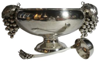 A massive South American silver punch bowl and ladle (20th century) with vine handles. (5,101