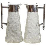 A pair of cut glass decanters with silver plated handles (H: 13.5cm)