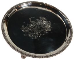 A good silver salver with gadroon edge & engraved armorial to center upon three shaped feet - (