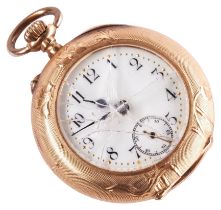 A SWISS 18K GOLD LADIES FOB WATCH, Keyless lever movement in a foliate engraved case, 30mm.