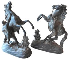 A PAIR OF SPELTER MARLEY HORSE MODELS, LATE 19TH CENTURY, naturalistically modelled and raised on