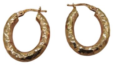 A PAIR OF ITALIAN 14CT GOLD HOOP EARRINGS, oval form with a planished finish, marked '585' and '
