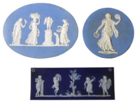 THREE 19TH CENTURY JASPERWARE PLAQUES, the lot includes oval and circular Wedgwood plaques and an