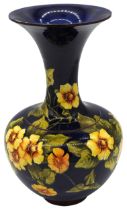 A DOULTON LAMBETH FAIENCE VASE BY MARY BUTTERTON, CIRCA 1890, bolster form with slender neck and