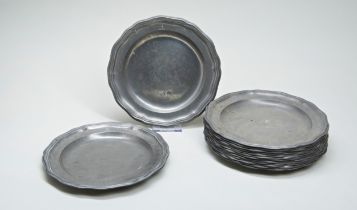 A SET OF FOURTEEN SILVER-SHAPED PEWTER PLATES by Gian Battista Sartoris, each engraved with a