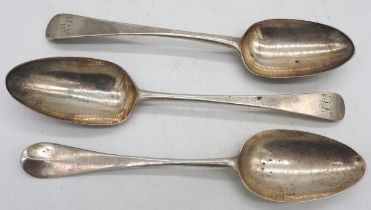 THREE GEORGE III SILVER SERVING SPOONS, two with monograms, one marked Thomas Liddiard, London,