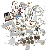 A SELECTION OF COSTUME JEWELLERY, including bead necklaces, pendants, earrings, brooches and four