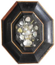 A MOTHER OF PEARL INLAID OCTAGONAL PANEL IN THE FORM OF A VASE OF FLOWERS with various insects,