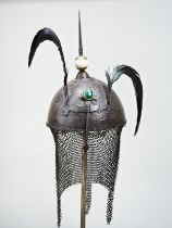 AN INDO/PERSIAN KHULA KHUD, the steel casque with foliate and animal decoration, plume holders, nose