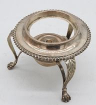 A GEORGIAN SILVER BURNER STAND, the frame with an incorporated burner with a gadrooned edge,