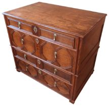 AN OAK GEORGE III CHEST OF DRAWERS IN THE JACOBEAN STYLE, CIRCA 1780, rectangular form with an array