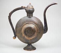 A LARGE PERSIAN CAST BRASS 'WATER JUG’ the body decorated with roundels of scrolling foliage and