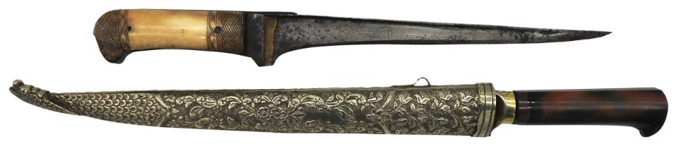 A KHYBER KNIFE with agate hilt and plain steel blade the white metal scabbard with ornate repousse
