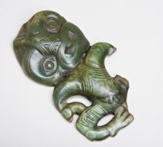 A LARGE MAORI NEPHRITE HEI TIKI in human form carved on one side. 13.8 cms high  NB. The Tiki has