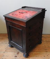 A 19TH CENTURY ROSEWOOD DAVENPORT, the hinged lid inset with a gilt tooled writing surface, the