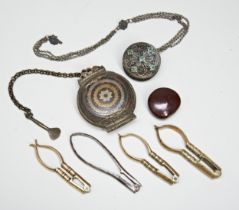 A COPPER ALLOY INDIAN BETEL NUT/LIME HOLDER WITH CHAIN AND SCOOP, a filigree case with enamelled