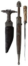 A YEMEN JAMBIYA KHANJAR DAGGER the T-shaped hilt decorated with raised dot bands and in a leather