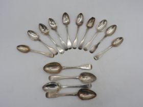 A MIXED GROUP OF FIDDLE PATTERN TEASPOONS AND DESSERT SPOONS, the majority engraved with