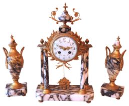 A FRENCH 19TH CENTURY MARBLE AND GILT METAL CLOCK GARNITURE, drum form clock case with festoon