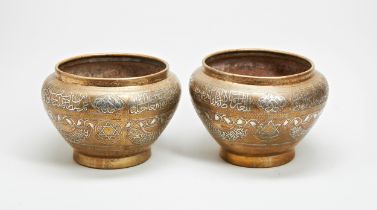 A PAIR OF CAIRO WARE COPPER AND SILVER INLAID JARDINIERES. 17cms high Provenance: from the Private