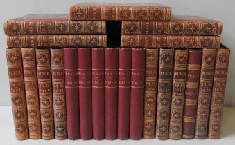 A GROUP OF TWENTY NINE BOUND VOLUMES OF PUNCH MAGAZINE, covering the period 1841-1893, some