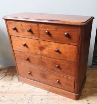 A VICTORIAN MAHOGANY CHEST OF DRAWERS, comprised of two short drawers over three long drawers, on