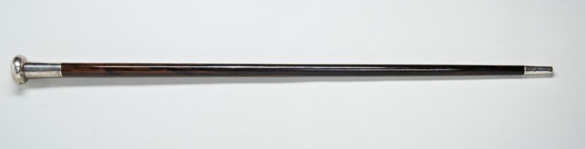 A CHINESE WALKING STICK MADE OF IRON WOOD, the heavy loaded silver top with a ‘Canton’ makers