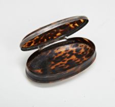 A GEORGIAN TORTOISESHELL BOX OF OVAL FORM WITH WHITE METAL MOUNTS.  Old rivet repair next to