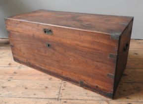 A VICTORIAN CAMPHOR WOOD CAMPAIGN TRUNK with brass binding and side handles. In need of restoration.