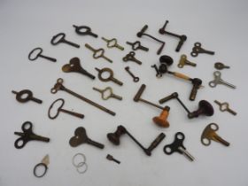 A QUANTITY OF CLOCK KEYS. Carriage, mantel and crank longcase winders. (qty) Provenance: from the