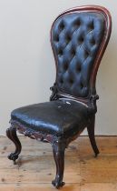A VICTORIAN LEATHER UPHOLSTERED SPOON BACK NURSING CHAIR, CIRCA 1860, buttoned leather covered