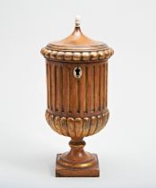 A 19TH CENTURY TEA CADDY IN THE FORM OF AN URN, the hinged lid with gadrooned border, the fluted