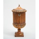 A 19TH CENTURY TEA CADDY IN THE FORM OF AN URN, the hinged lid with gadrooned border, the fluted