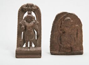 AN INDIAN CARVED STONE ARCHED TOP VOTIVE PLAQUE OF HANUMAN and another of a Hindu deity. 18 x 9