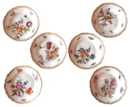 A SET OF SIX DRESDEN TEA PLATES, EARLY 20TH CENTURY, each hand painted with Deutsche Bleumen