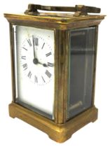 A FRENCH BRASS CASED CARRIAGE CLOCK, CIRCA 1904, by R & Co. Paris, the top inscribed with a