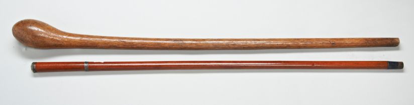 A 19TH CENTURY SWORD STICK with white metal mounts and a shillelagh walking stick. 94 cms max
