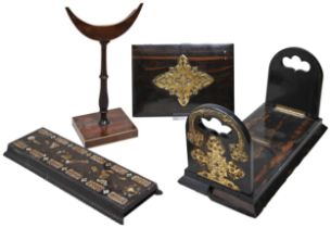 A GEORGE III MAHOGANY LOOKING GLASS STAND, a Victorian coromandel book slide with brass mounts (Some