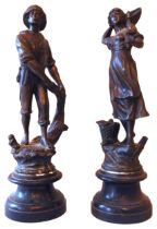 A PAIR OF FRENCH SPELTER FIGURES, LATE 19TH CENTURY, modelled as a fisherman and his wife, with nets